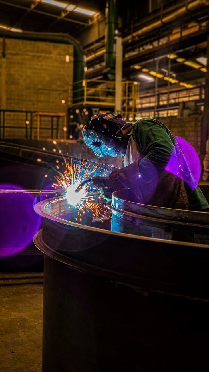 welder at work in factory