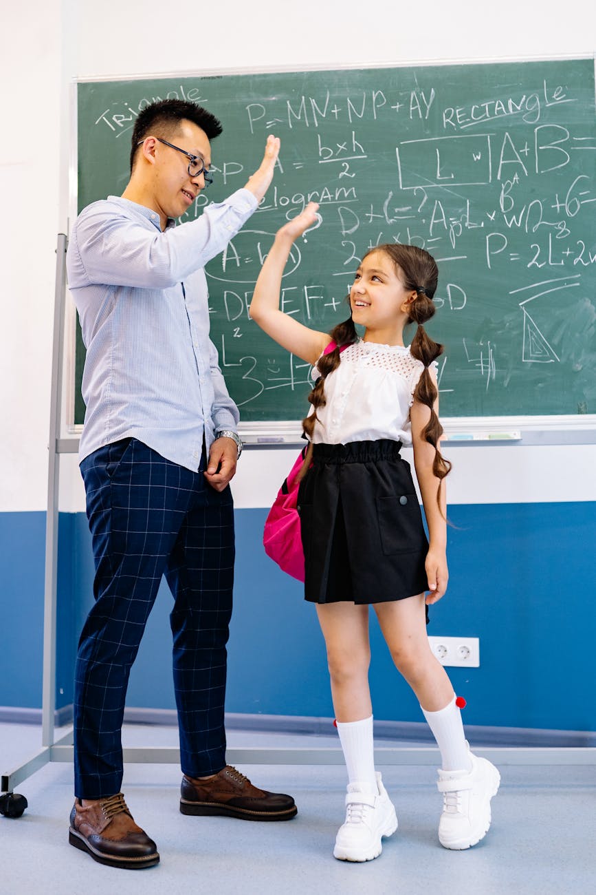 man giving a girl a high five